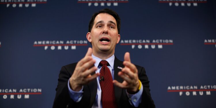 Walker joins government reform group as chairman