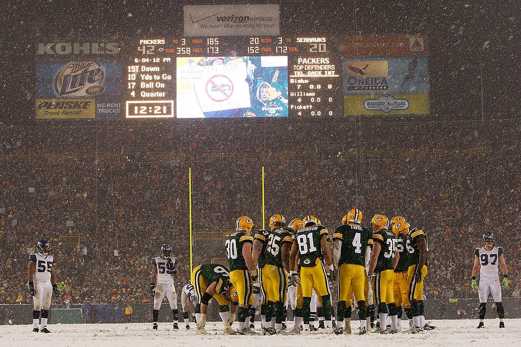 It was perfectly ideal. Snow globe conditions and a hot Green Bay Packers team as they scored 42 straight points en route to defeating the Seattle Seahawks in the 2007 NFC Divisional Playoff, 42-20. Little did the fans at Lambeau Field know it would be Brett Favre's last win as a Green Bay Packer. (Photo by Jamie Squire/Getty Images)