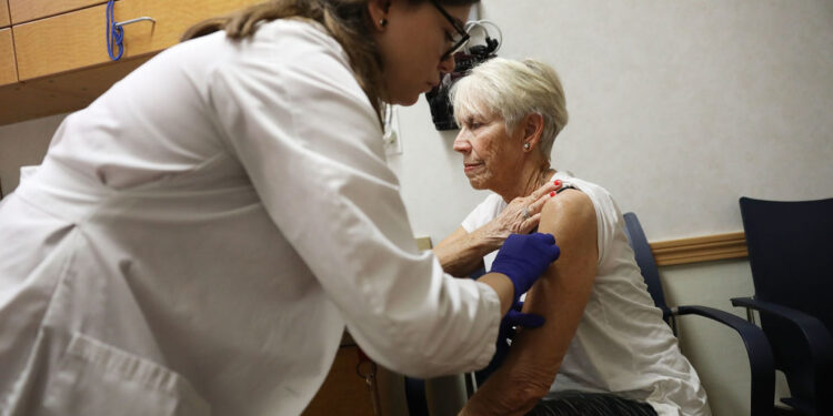 Child dies as flu cases spike in Wisconsin