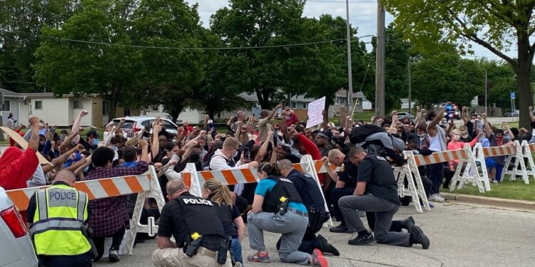 The latest: Protests in Waukesha Monday with police participating