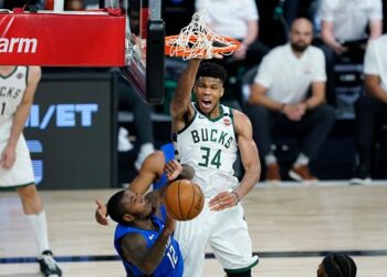 Antetokounmpo leads efficient Bucks to 121-107 rout of Magic