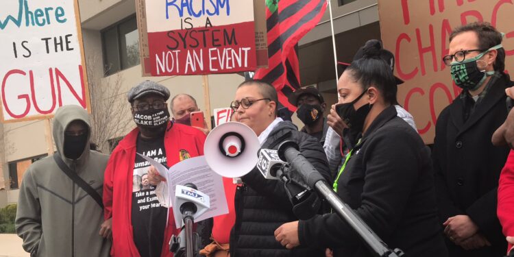 Dozens of protestors march on Kenosha Police headquarters Sunday, demand answers