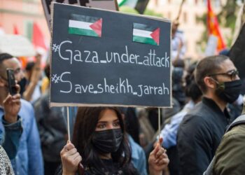 Israel escalates attacks on Gaza Strip, killing family of 10 in refugee camp, leveling high-rise housing media outlets