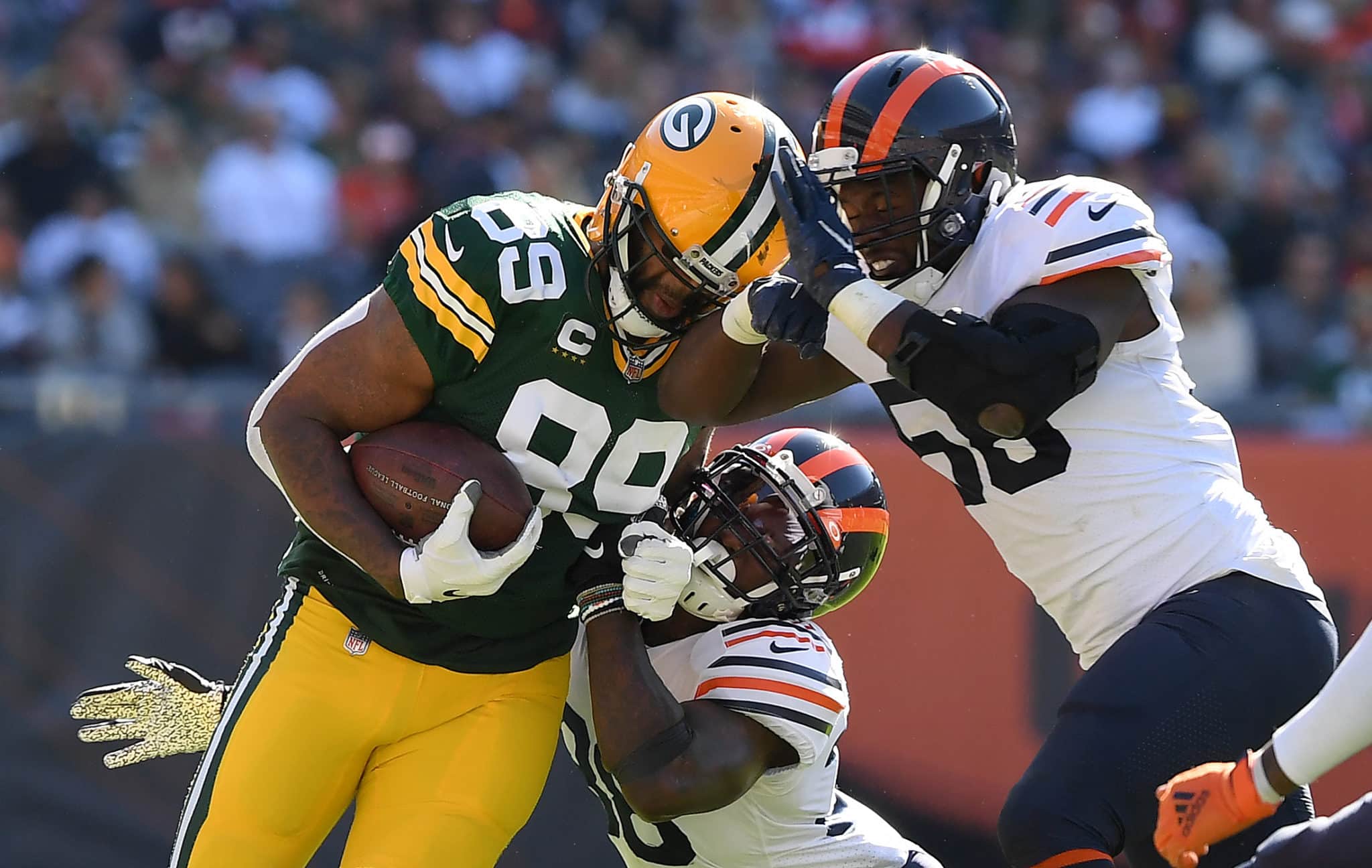 Green Bay Packers tight end Marcedes Lewis (89) is tackled by