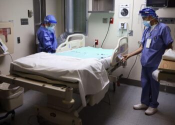 Wisconsin hospital system strained amid influx of COVID and influenza cases