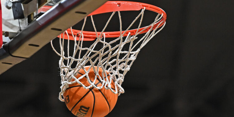 St. Thomas More High School coach steadfast on keeping  season alive