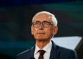 MILWAUKEE, WISCONSIN - AUGUST 19: Wisconsin Governor Tony Evers awaits to address the virtual Democratic National Convention, at the Wisconsin Center on August 19, 2020 in Milwaukee, Wisconsin. The convention, which was once expected to draw 50,000 people to Milwaukee, Wisconsin, is now taking place virtually due to the coronavirus pandemic. (Photo by Melina Mara - Pool/Getty Images)