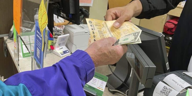 Ticket sales jump as Powerball jackpot balloons