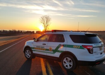 An Ozaukee County Sheriff's Office vehicle on a two-lane road