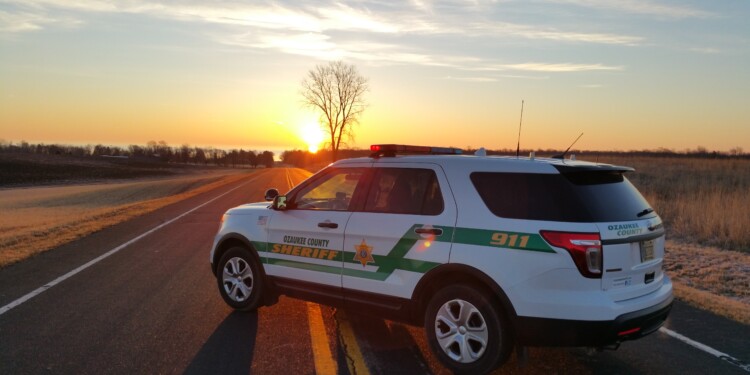 An Ozaukee County Sheriff's Office vehicle on a two-lane road