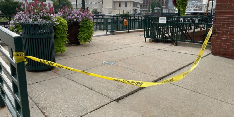 Police tape near MLK and Highland