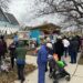 People waiting for free produce at All Peoples Gathering Church in Milwaukee.