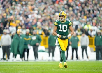 GREEN BAY, WISCONSIN - JANUARY 07: Jordan Love #10 of the Green Bay Packers looks on during the first half against the Chicago Bears at Lambeau Field on January 07, 2024 in Green Bay, Wisconsin. (Photo by Patrick McDermott/Getty Images)