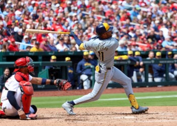 ST. LOUIS, MO - APRIL 20:  Jackson Chourio #11 of the Milwaukee Brewers hits a solo home run during the third inning against the St. Louis Cardinals at Busch Stadium on April 20, 2024 in St. Louis, Missouri. (Photo by Scott Kane/Getty Images)