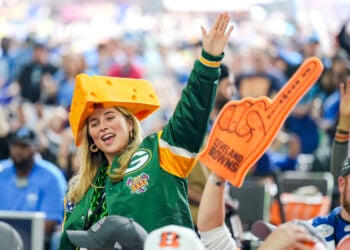 DETROIT, MICHIGAN - APRIL 27: A Green Bay packers fan dances during round four of the 2024 NFL draft at Campus Martius Park and Hart Plaza on April 27, 2024 in Detroit, Michigan. (Photo by Nic Antaya/Getty Images)