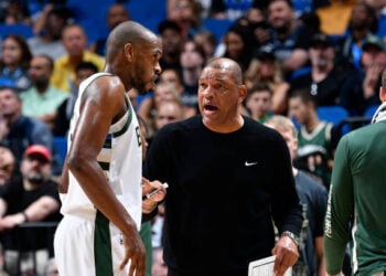 ORLANDO, FL - APRIL 14: Head Coach Doc Rivers of the Milwaukee Bucks talks to Khris Middleton #22 during the game against the Orlando Magic on April 14, 2024 at Kia Center in Orlando, Florida. NOTE TO USER: User expressly acknowledges and agrees that, by downloading and or using this photograph, User is consenting to the terms and conditions of the Getty Images License Agreement. Mandatory Copyright Notice: Copyright 2024 NBAE (Photo by Fernando Medina/NBAE via Getty Images)