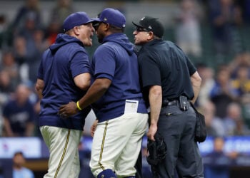 MILWAUKEE, WISCONSIN - APRIL 30: Manager Pat Murphy #21 of the Milwaukee Brewers gets thrown out of the game by home plate umpire Chris Guccione #68 in the sixth inning during the game between the Tampa Bay Rays and the Milwaukee Brewers at American Family Field on April 30, 2024 in Milwaukee, Wisconsin. (Photo by John Fisher/Getty Images)