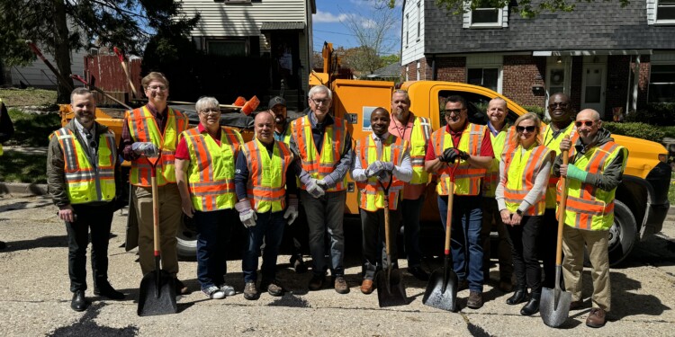 Gov Tony Evers and Mayor Johnson after filling potholes in Milwaukee with DPW workers