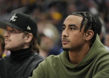 Packers quarterback Jordan Love not practicing at training camp as contract negotiations continue