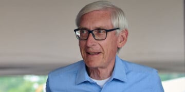Wisconsin Gov. Tony Evers attends the annual Hmong Wausau Festival in Wausau, Wisconsin, Saturday, July 27, 2024. (Photo by Dominic Gwinn / Middle East Images / Middle East Images via AFP) (Photo by DOMINIC GWINN/Middle East Images/AFP via Getty Images)