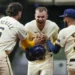 Jake Bauers hits game-ending single to lift NL Central-clinching Brewers to 2-1 win over Phillies