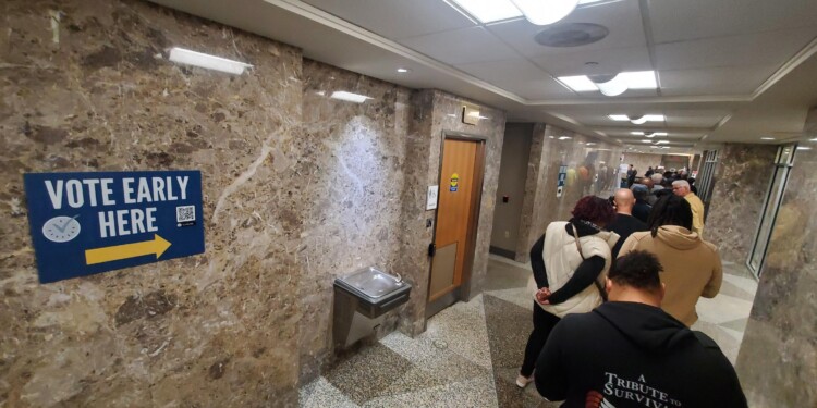 Early voting kicks off in battleground Wisconsin with a push from Obama and Walz