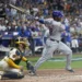 Mets continue wild ride with 8-4 win over Brewers in playoff opener