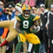 GREEN BAY, WISCONSIN - NOVEMBER 24: Running back Josh Jacobs #8 of the Green Bay Packers runs the ball during the first half of an NFL football game against the San Francisco 49ers at Lambeau Field on November 24, 2024 in Green Bay, Wisconsin. (Photo by Todd Rosenberg/Getty Images)