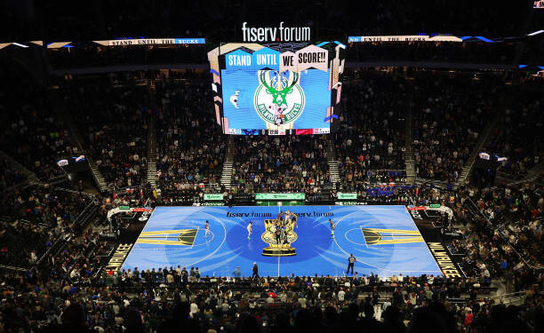 Shorthanded Bucks begin group play with 99-85 win over Raptors