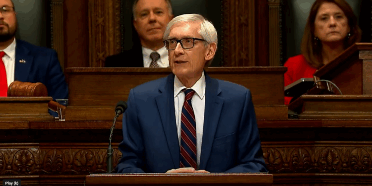 Wisconsin’s Evers calls for gun control measures and a bipartisan approach to immigration