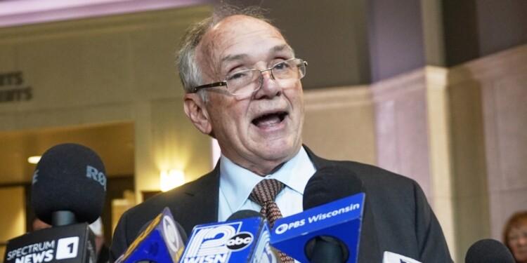 Jim Troupis reads a statement after his court appearance outside a Dane County courtroom on Dec. 12, 2024, in Madison, Wis. (AP Photo/Morry Gash, File)