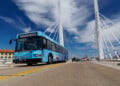 A Milwaukee County Transit System bus drives on 6th Street in Milwaukee. Image Credit: Milwaukee County Transit System