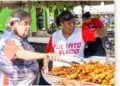 2 ladies serving up delicious Puerto Rican food
