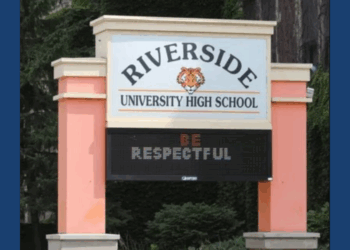 Delaying the first day of classes at Riverside University High School for chemical spill cleanup