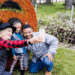 Family Takes A Selfie With Halloween Decor At The Swiss Historical Village Museum In New Glarus (Photo: Travel Wisconsin)