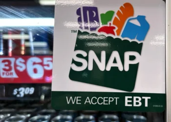 SNAP EBT information sign is displayed at a gas station in Riverwoods, Ill., Saturday, Nov. 1, 2025. (AP Photo/Nam Y. Huh, file)