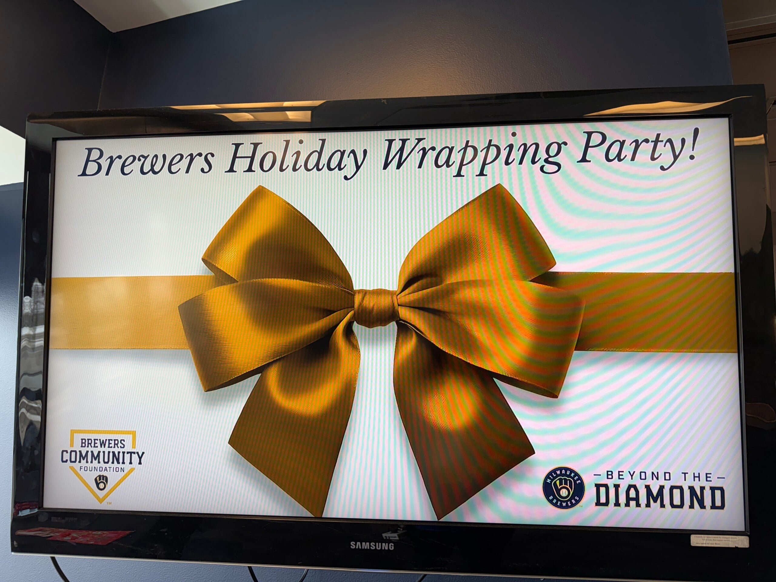 Brewers wrap $5,000 in toys for Milwaukee kids for All Hands On Deck event