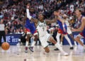 DENVER, COLORADO - JANUARY 11: Kevin Porter Jr. #7 of the Milwaukee Bucks reacts after a loose ball during the second quarter against the Denver Nuggets at Ball Arena on January 11, 2026 in Denver, Colorado. NOTE TO USER: User expressly acknowledges and agrees that, by downloading and or using this photograph, User is consenting to the terms and conditions of the Getty Images License Agreement. (Photo by Tanner Pearson/Clarkson Creative/Getty Images)