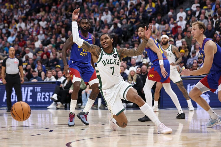 DENVER, COLORADO - JANUARY 11: Kevin Porter Jr. #7 of the Milwaukee Bucks reacts after a loose ball during the second quarter against the Denver Nuggets at Ball Arena on January 11, 2026 in Denver, Colorado. NOTE TO USER: User expressly acknowledges and agrees that, by downloading and or using this photograph, User is consenting to the terms and conditions of the Getty Images License Agreement. (Photo by Tanner Pearson/Clarkson Creative/Getty Images)
