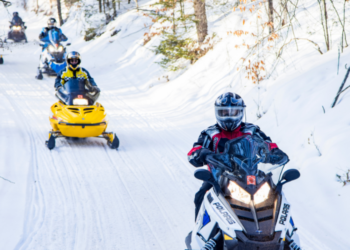 015 Friends Going on Snowmobile Guide Trip Through Northwoods Adventure Motorsports in Lakewood
