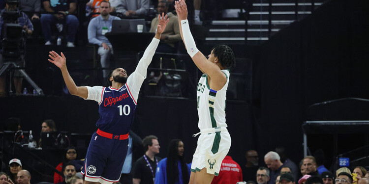 INGLEWOOD, CA - March 23: Ousmane Dieng #21f the Milwaukee Bucks shoots over Darius Garlan #10 of the Los Angeles Clippers during the first half on March 23, 2026 at the Intuit Dome in Inglewood, California. NOTE TO USER: User expressly acknowledges and agrees that, by downloading and or using this photograph, User is consenting to the terms and conditions of the Getty Images License Agreement. (Photo by Kevin Terrell/Getty Images)