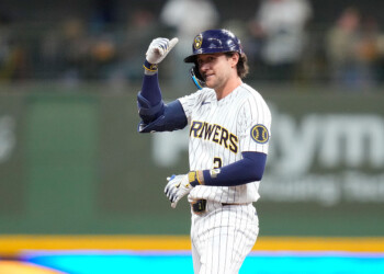 MILWAUKEE, WISCONSIN - MARCH 28: Brice Turang #2 of the Milwaukee Brewers reacts after hitting a double in the second inning against the Chicago White Sox at American Family Field on March 28, 2026 in Milwaukee, Wisconsin. (Photo by John Fisher/Getty Images)