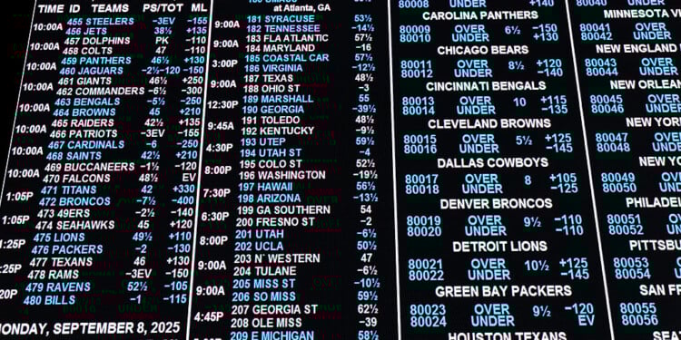 Governor Tony Evers signs online sports betting bill while expressing concerns