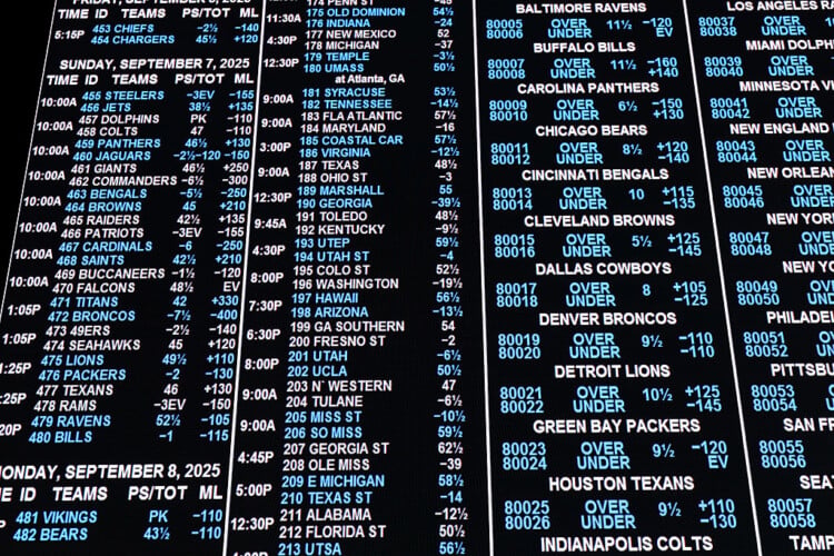 Governor Tony Evers signs online sports betting bill while expressing concerns