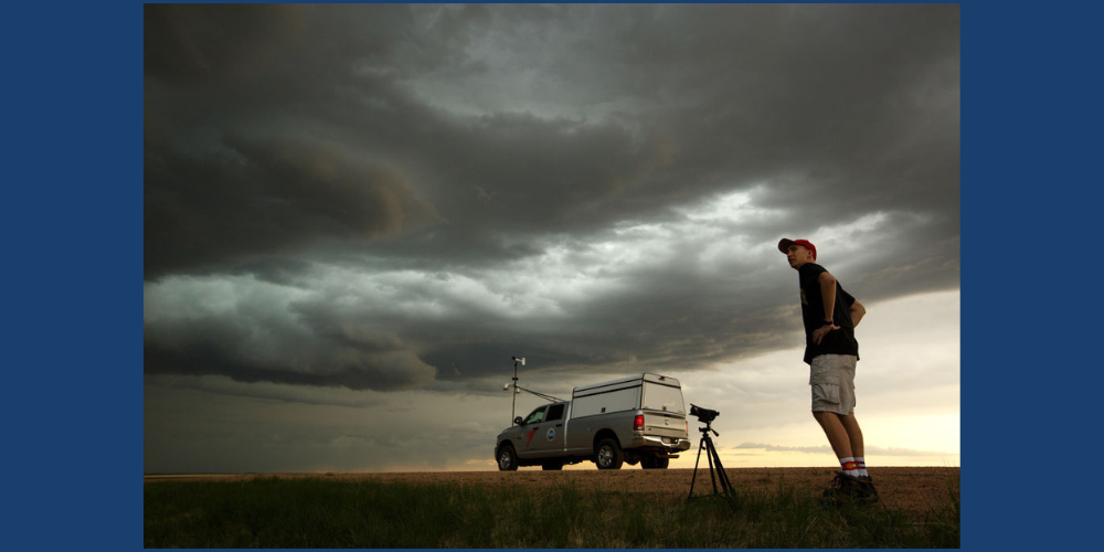 Storm spotter watching for signs of danger