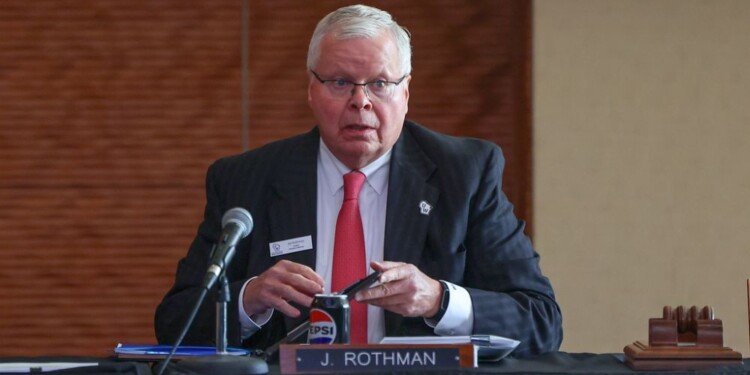 FILE - University of Wisconsin System President Jay Rothman prepares his materials before a UW Board of Regents meeting on Sept. 18, 2025, at Gordon Commons at UW-Madison in Madison, Wis. (Owen Ziliak/Wisconsin State Journal via AP, File)
