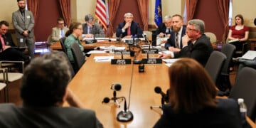 UW Board of Regents President Amy Bogost and Regent Timothy Nixson, close, are questioned at a hearing with the Wisconsin State Senate Committee on Education on Thursday, April 9, 2026 at the Wisconsin State Capitol in Madison, Wis. (Owen Ziliak/Wisconsin State Journal via AP)