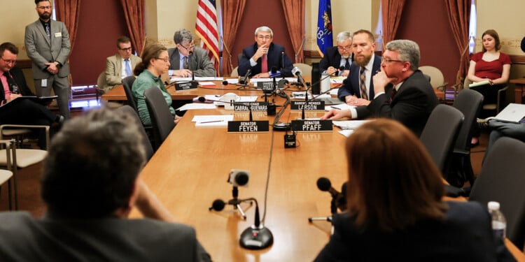 UW Board of Regents President Amy Bogost and Regent Timothy Nixson, close, are questioned at a hearing with the Wisconsin State Senate Committee on Education on Thursday, April 9, 2026 at the Wisconsin State Capitol in Madison, Wis. (Owen Ziliak/Wisconsin State Journal via AP)