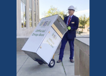 Wausau Mayor Doug Diny removing the ballot drop box in 2024.