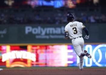 Joey Ortiz rounds the bases after hitting a home run.